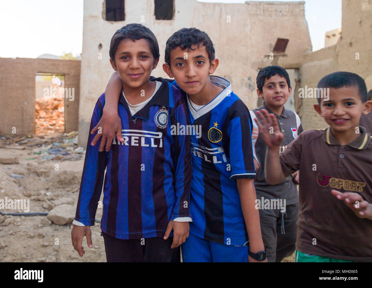 Saudi boys in the street, Najran Province, Najran, Saudi Arabia Stock Photo