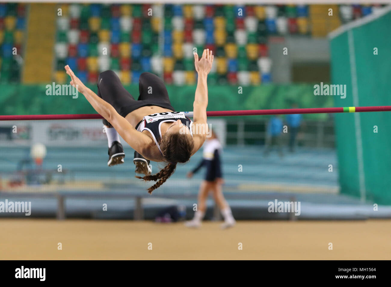 ISTANBUL, TURKEY - JANUARY 14, 2018: Undefined athlete high jumping ...