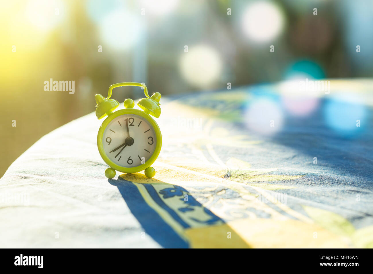 Small analogue clock in hi-res stock photography and images - Alamy