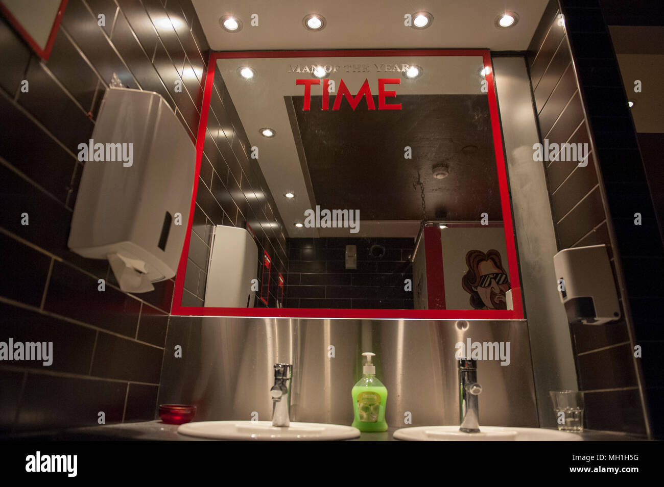 A mirror in the men's toilet in Reykjavik, Iceland Stock Photo Alamy