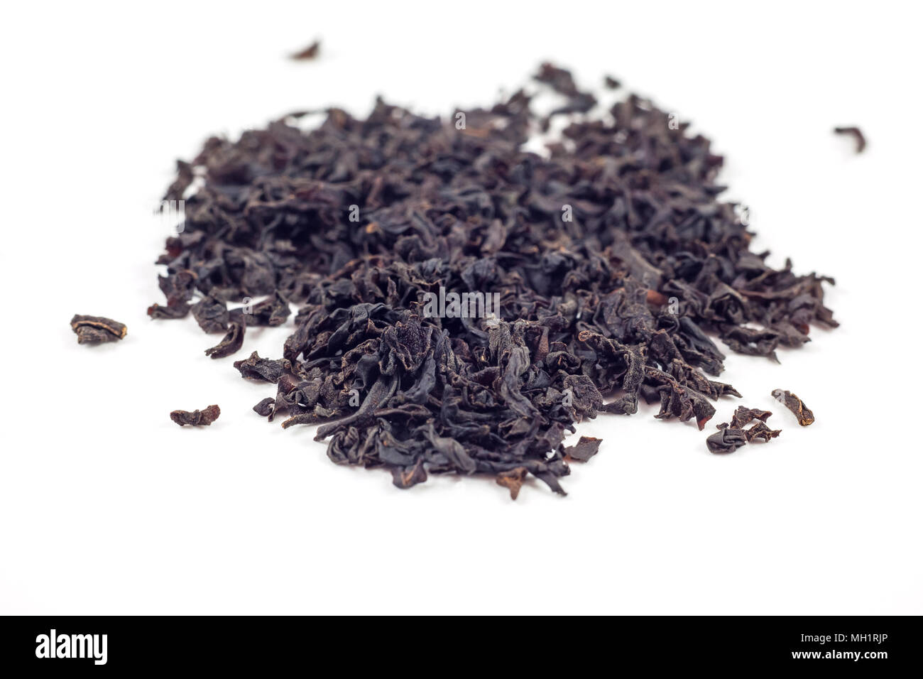 Dry black tea leaves isolated on white background Stock Photo Alamy