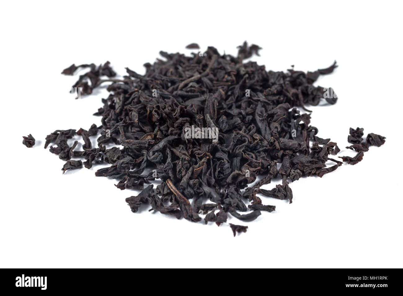 Dry black tea leaves isolated on white background Stock Photo Alamy