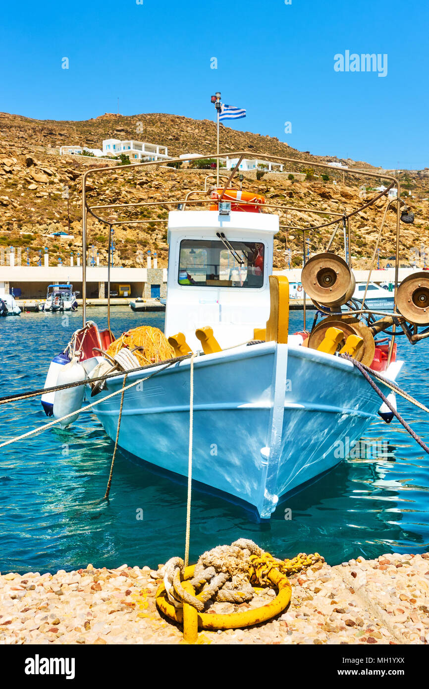 Old fishing boat in port of Thira in Santorini, Greece Stock Photo