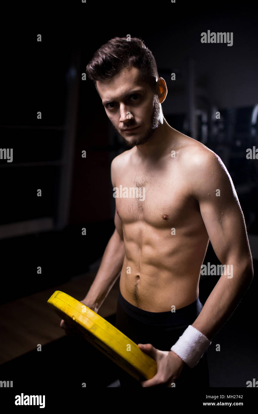 Guy exercising with disk Stock Photo Alamy