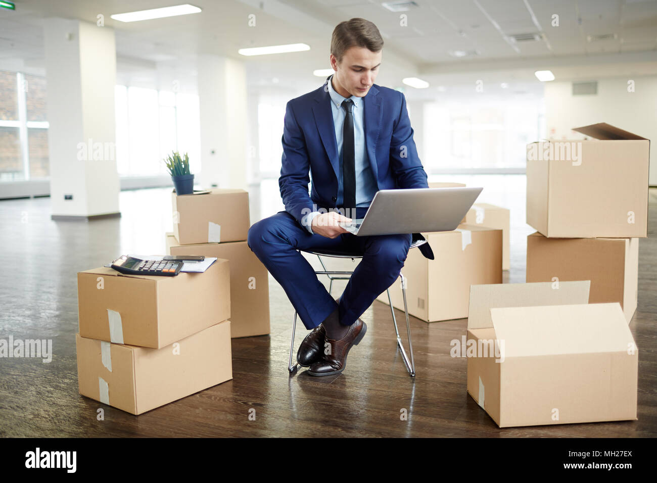 Businessman in new office Stock Photo