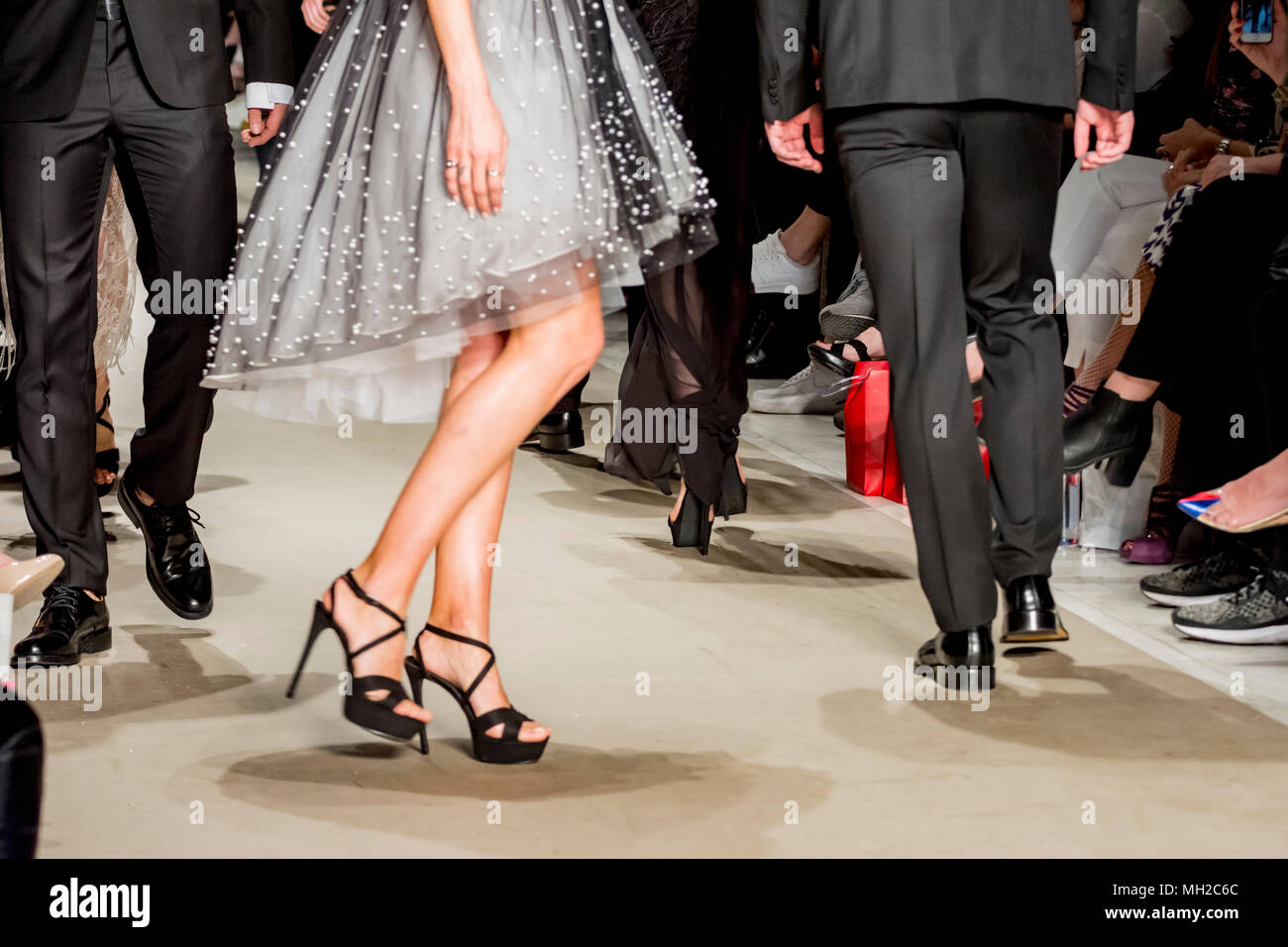 male and female models at the end of the fashion show Stock Photo - Alamy