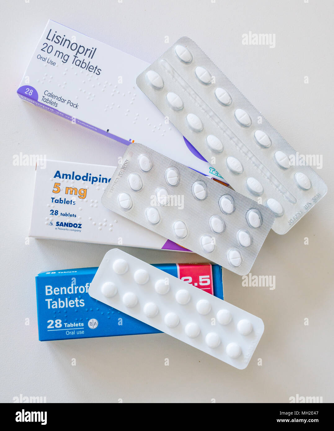 Packs of tablets for treatment of hypertension or high blood pressure. Lisinopril, Amlodipine (Norvasc) and Bendroflumethiazide (Furosemide) Stock Photo