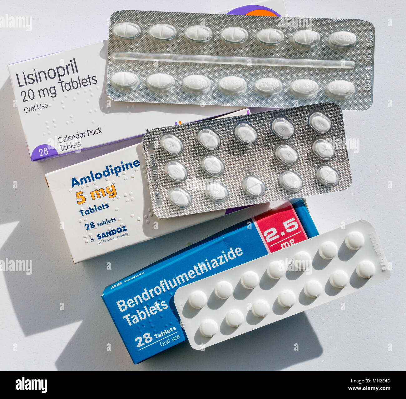 Packs of tablets for treatment of hypertension or high blood pressure. Lisinopril, Amlodipine (Norvasc) and Bendroflumethiazide (Furosemide) Stock Photo