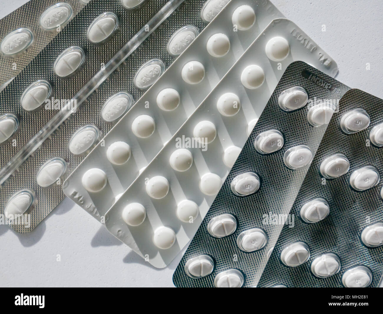 Close up tablets for treatment of hypertension or high blood pressure. Lisinopril, Amlodipine (Norvasc) and Bendroflumethiazide (Furosemide) Stock Photo