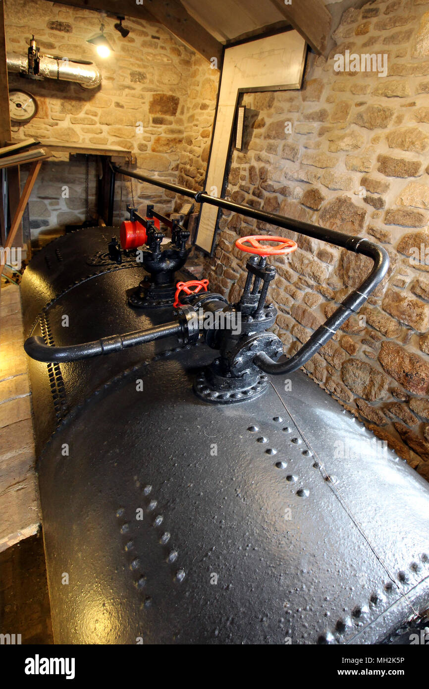 Cast iron coal fired boiler of an industrial steam engine used at a tin  mine in Cornwall Stock Photo - Alamy