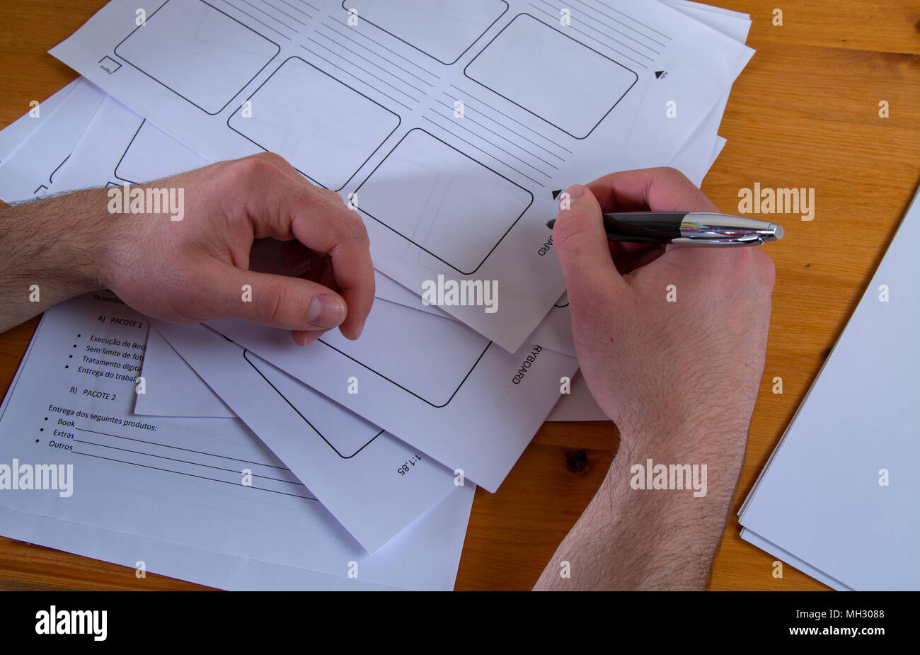 a young man writing, making an argument for a video Stock Photo