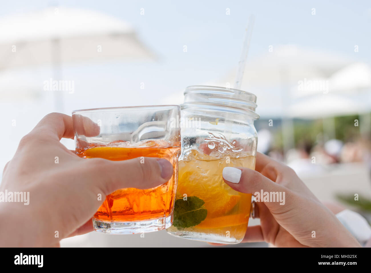 two coctail glasses beach club Stock Photo Alamy