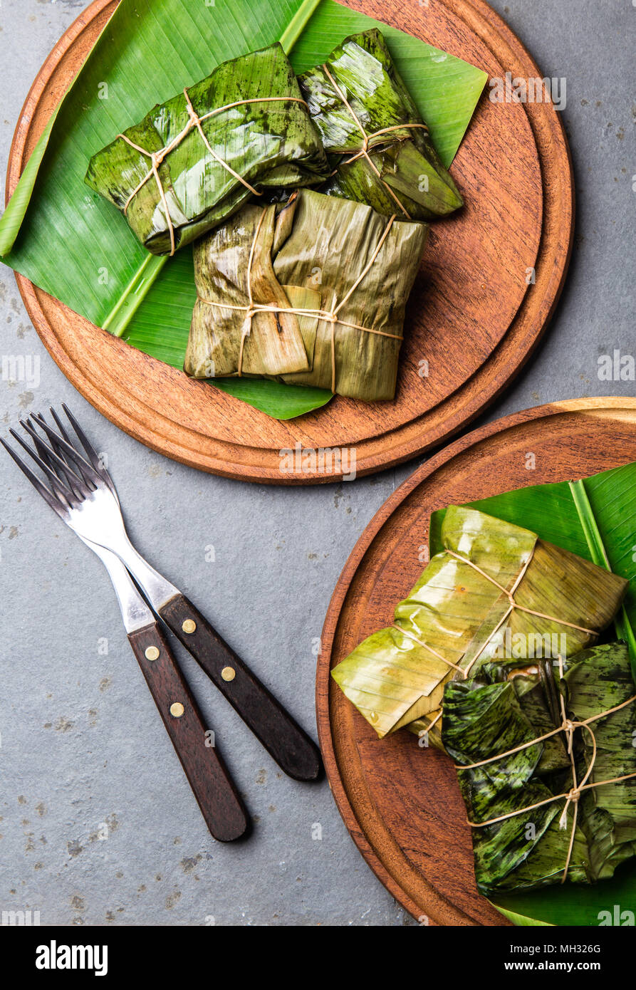 COLOMBIAN, CENTRAL AMERICAN FOOD. Tamales wrapped in banana palm tree
