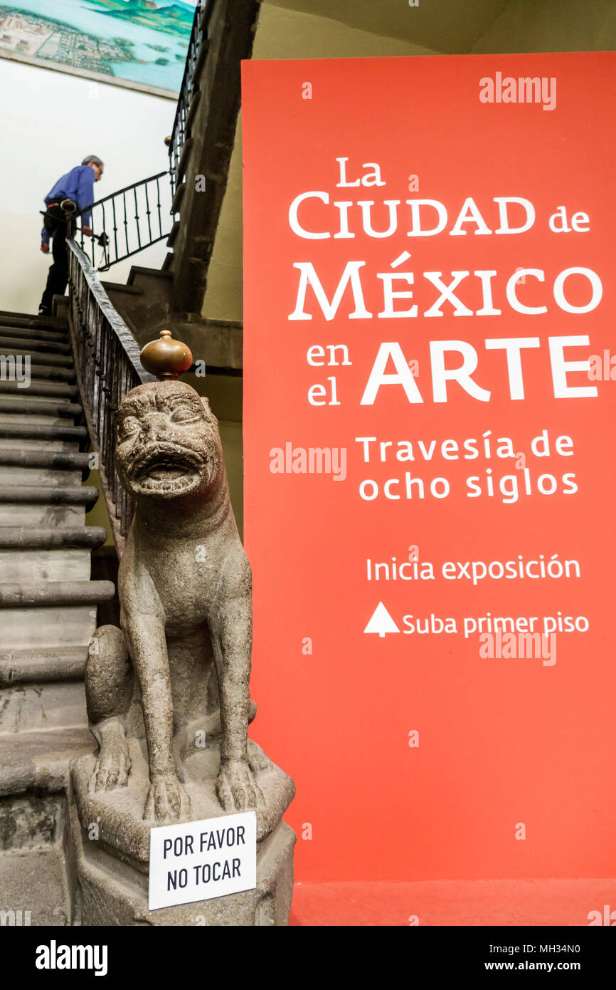 Mexico City,Mexican,Hispanic,historic Center Centre,Museo de la Mexico Museum City,stairway,carved stone lion,sign,poster,do not touch,art exhibit MX1 Stock Photo