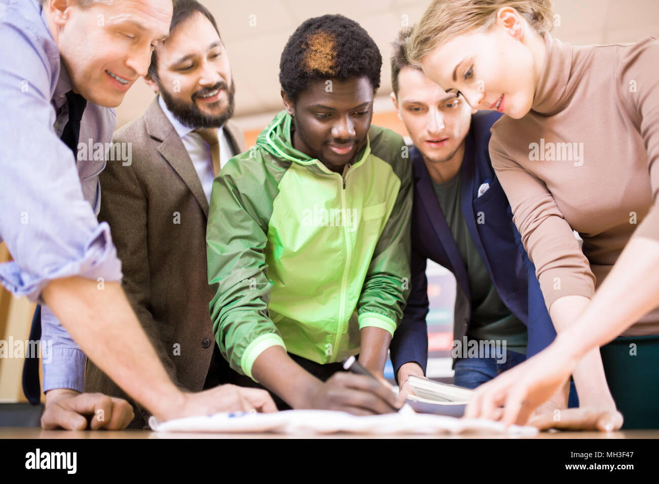 Football Player Signing Flag Stock Photo