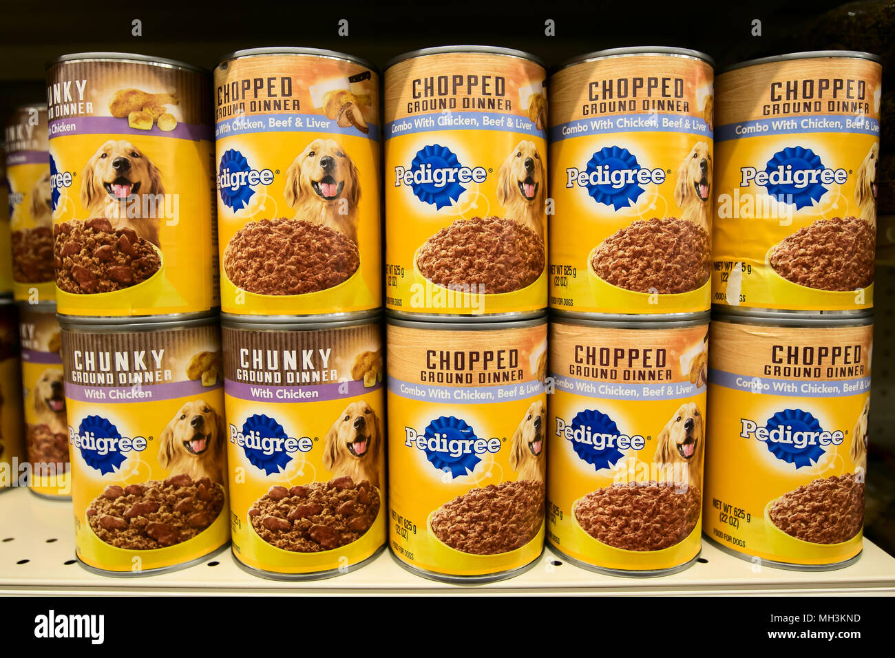 Holetown, Barbados, 03-19-2018: Cans of Pedigree dog food stand on a shelf of a supermarket. Stock Photo
