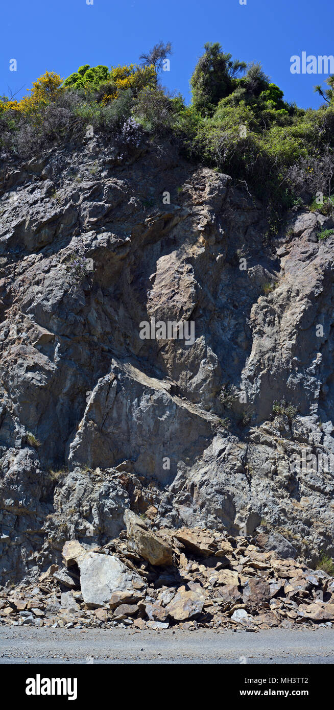 Kaikoura, New Zealand - November 15, 2016: Slips and rock slides line Highway One in The Hunderlee Hills, North Canterbury after the 7.5  Kaikoura Ear Stock Photo