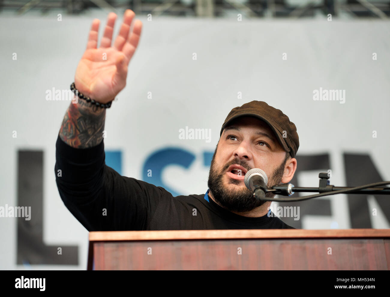 4-21-2018, SPRINT Pavilion, Charlottesville, VA, USA.  Former white supremacist and author Christian Picciolini speaking during Listen First in Charlottesville.  Listen First was part of the first National Week of Conversation (April 20-28, 2018).  Listen First’s weekend events in Charlottesville were created to support healing and reconciliation after 2017 white supremacist and pro-confederacy protests left one woman dead and a community divided.  A small number of seats of the 3,500 seat amphitheater were occupied on Saturday as speakers and panel discussions were presented. Stock Photo