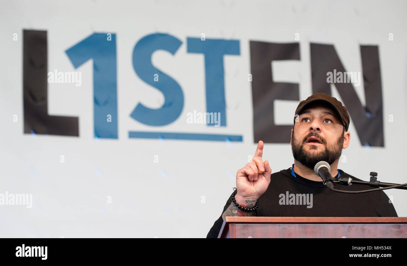 4-21-2018, SPRINT Pavilion, Charlottesville, VA, USA.  Former white supremacist and author Christian Picciolini speaking during Listen First in Charlottesville.  Listen First was part of the first National Week of Conversation (April 20-28, 2018).   Listen First’s weekend events in Charlottesville were created to support healing and reconciliation after 2017 white supremacist and pro-confederacy protests left one woman dead and a community divided.  A small number of seats of the 3,500 seat amphitheater were occupied on Saturday as speakers and panel discussions  were presented. Stock Photo