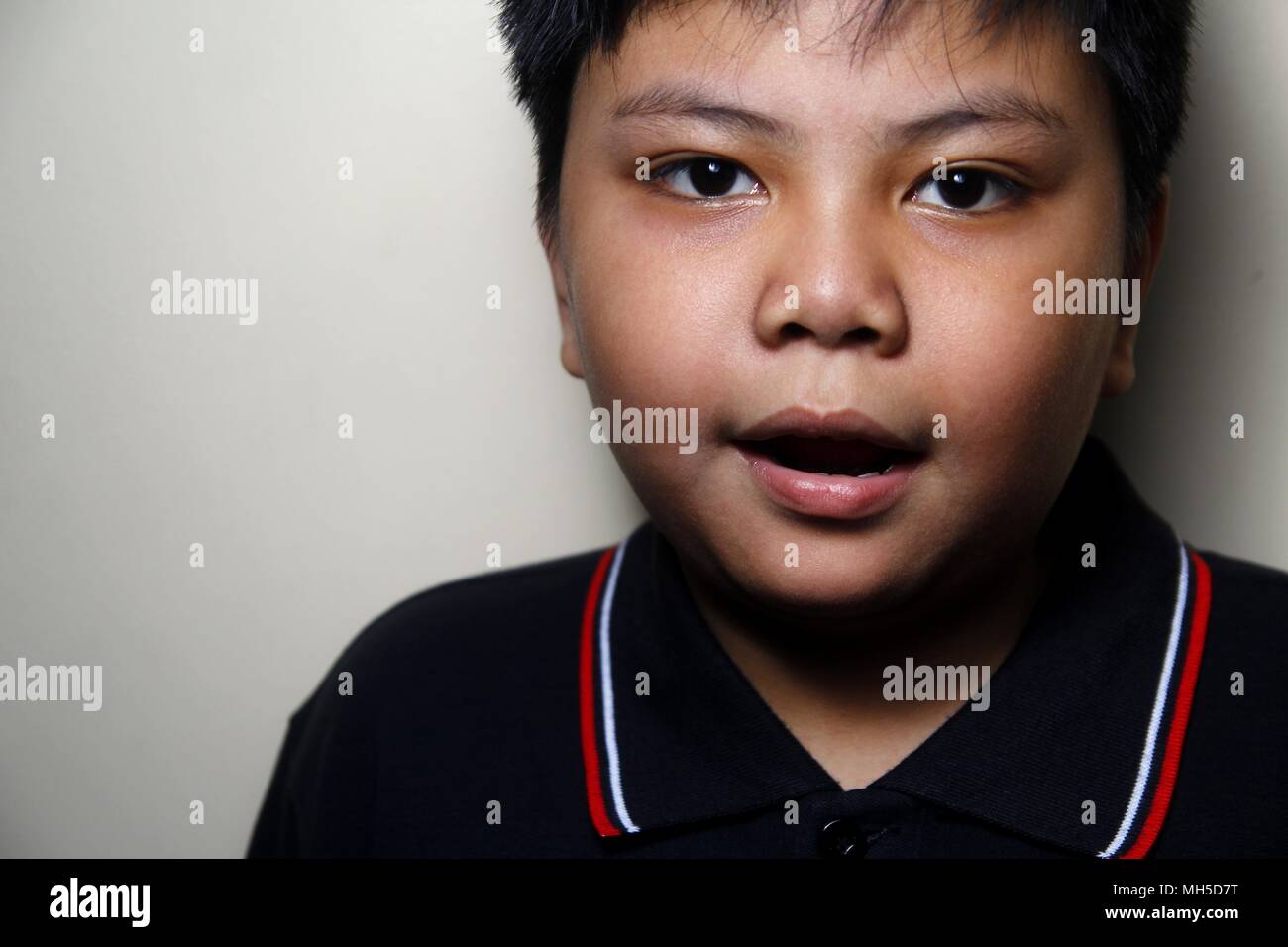 Close up portrait of a young Asian boy Stock Photo