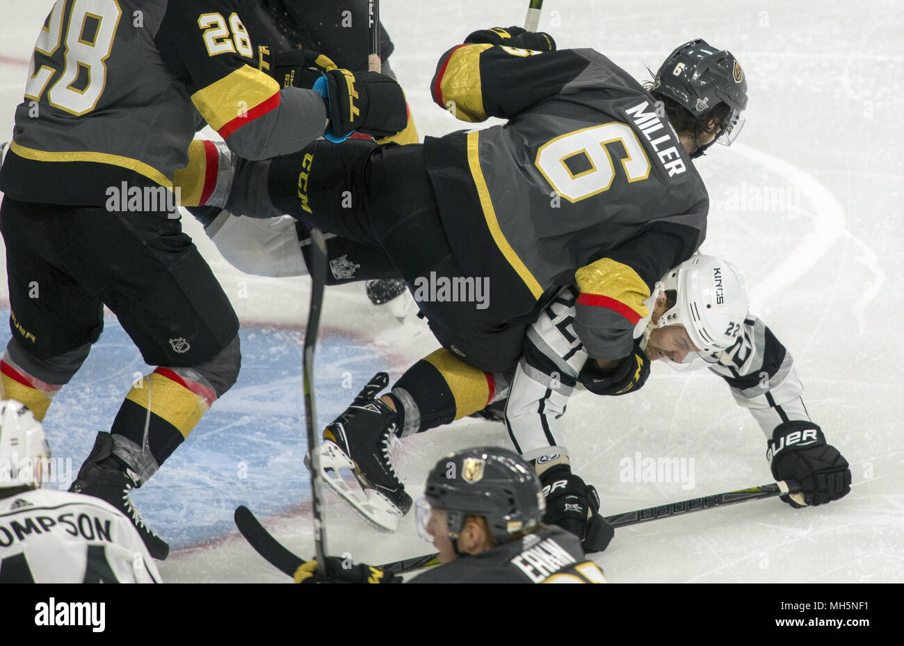 Las Vegas, Nevada, USA. 11th Apr, 2018. Vegas Golden Knights defenseman Colin Miller (6) takes Los Angeles Kings center Trevor Lewis (22) down onto the ice as another soap breaks out during their first playoff game at the T-Mobile Arena on Wednesday, April 11, 2018, in Las Vegas. Credit: L.E. Baskow/ZUMA Wire/Alamy Live News Stock Photo