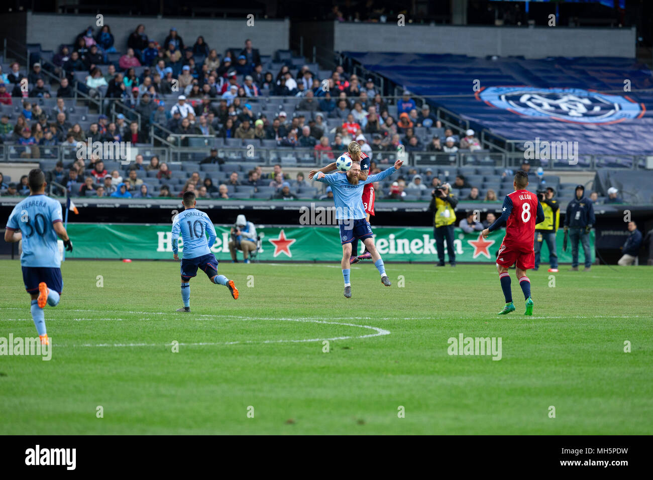 New York, USA - April 29, 2018: Jo Inge Benget (9) of NYCFC & Reto Ziegler (3) of Dallas FC fight for ball during MLS regular game on Yankee stadium NYCFC won 3 - 1 Credit: lev radin/Alamy Live News Stock Photo