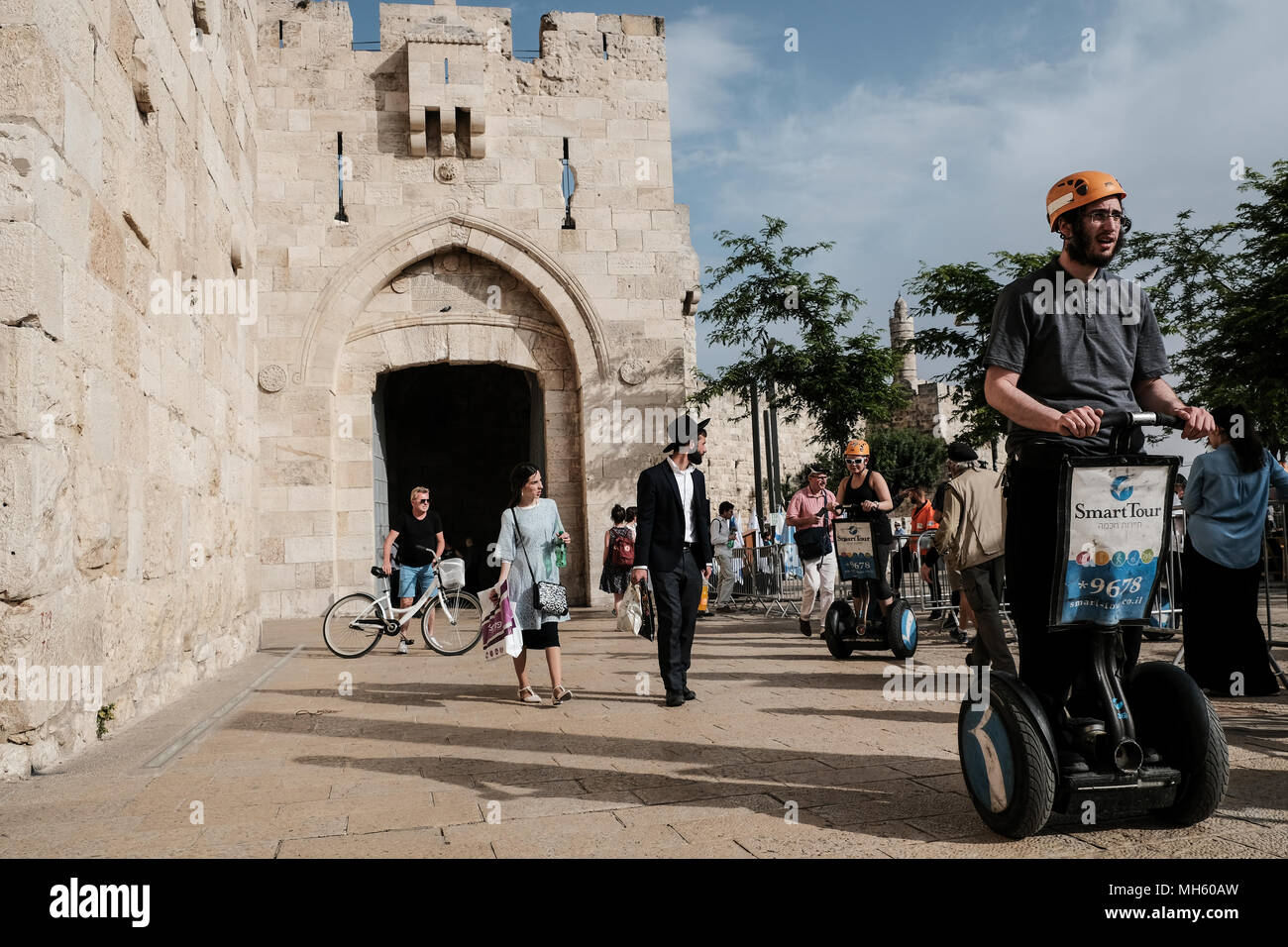 Jerusalem, Israel. 30th April, 2018. Tourists enjoy a Segway tour outside Jerusalem's Old City Jaffa Gate. Credit: Nir Alon/Alamy Live News Stock Photo