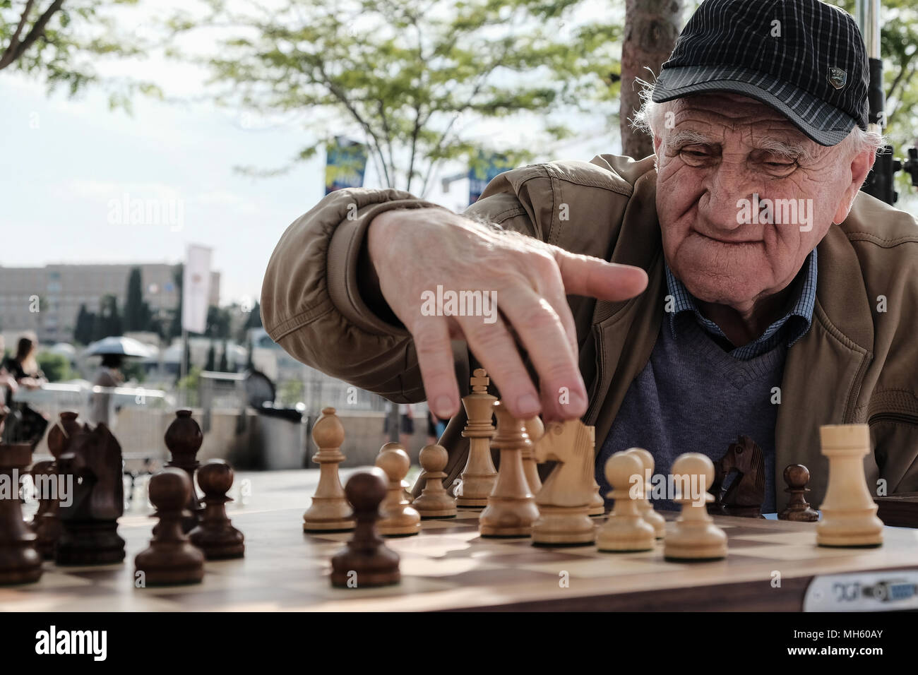 Jerusalem, Israel. 30th April, 2018. Elderly men play a game of chess outside Jerusalem's Old City Jaffa Gate. Credit: Nir Alon/Alamy Live News Stock Photo