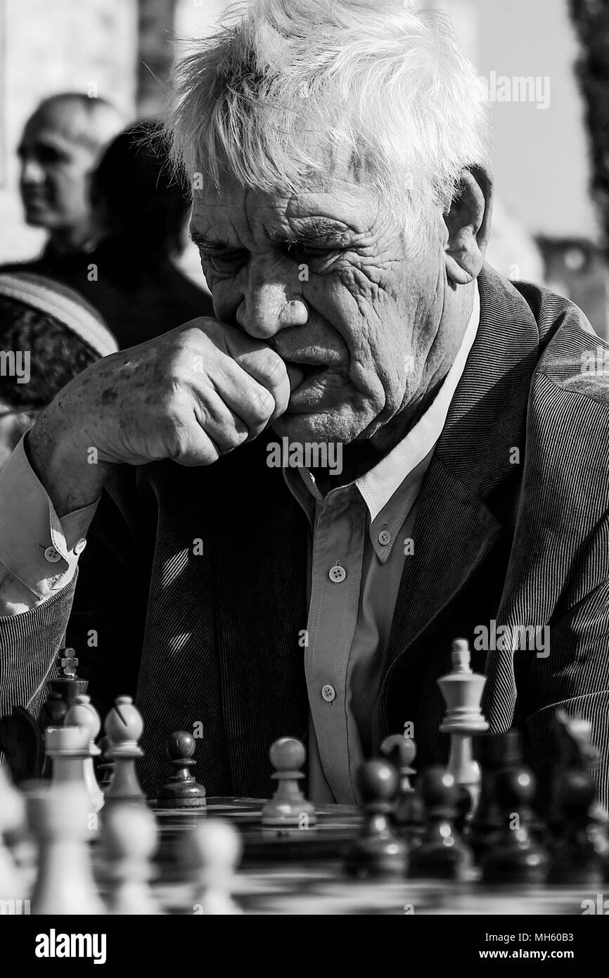 Jerusalem, Israel. 30th April, 2018. Elderly men play a game of chess outside Jerusalem's Old City Jaffa Gate. Credit: Nir Alon/Alamy Live News Stock Photo