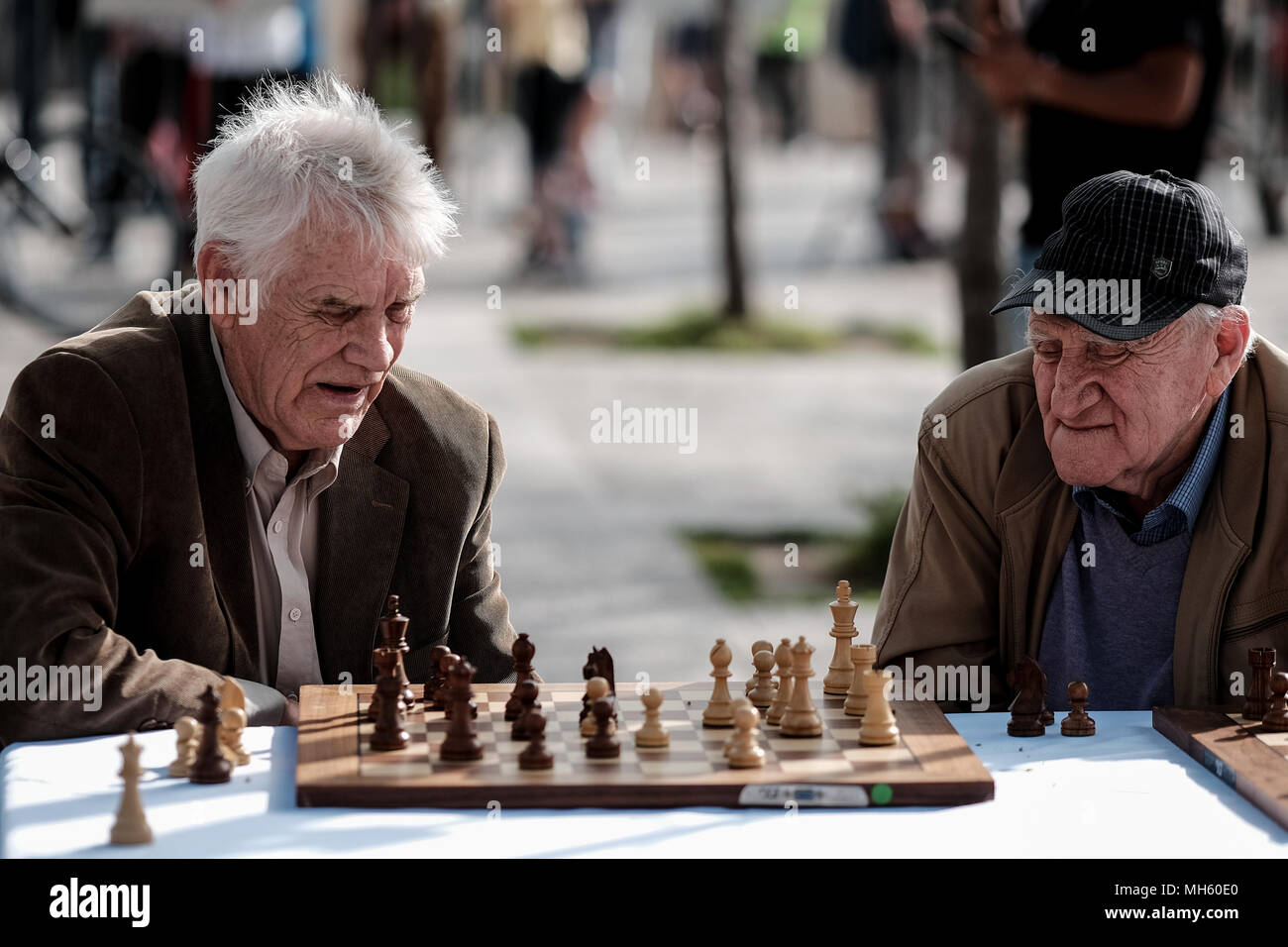 Jerusalem, Israel. 30th April, 2018. Elderly men play a game of chess outside Jerusalem's Old City Jaffa Gate. Credit: Nir Alon/Alamy Live News Stock Photo