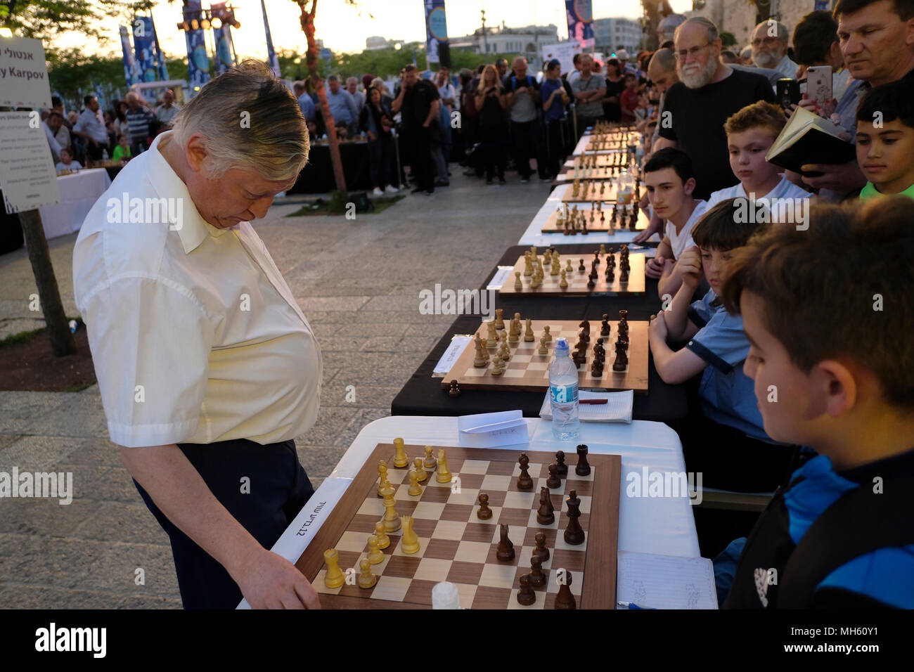 Jerusalem, Israel 30th April 2018. Russian State Duma member, chess grandmaster and former World Champion Anatoly Yevgenyevich Karpov giving a simultaneous exhibition with young Israeli participants during a simul display marking Israel's 70th anniversary in Jerusalem Stock Photo