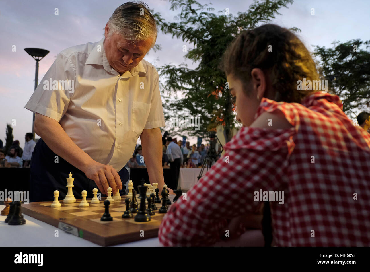 World chess champion Anatoly Karpov having a simultaneous display