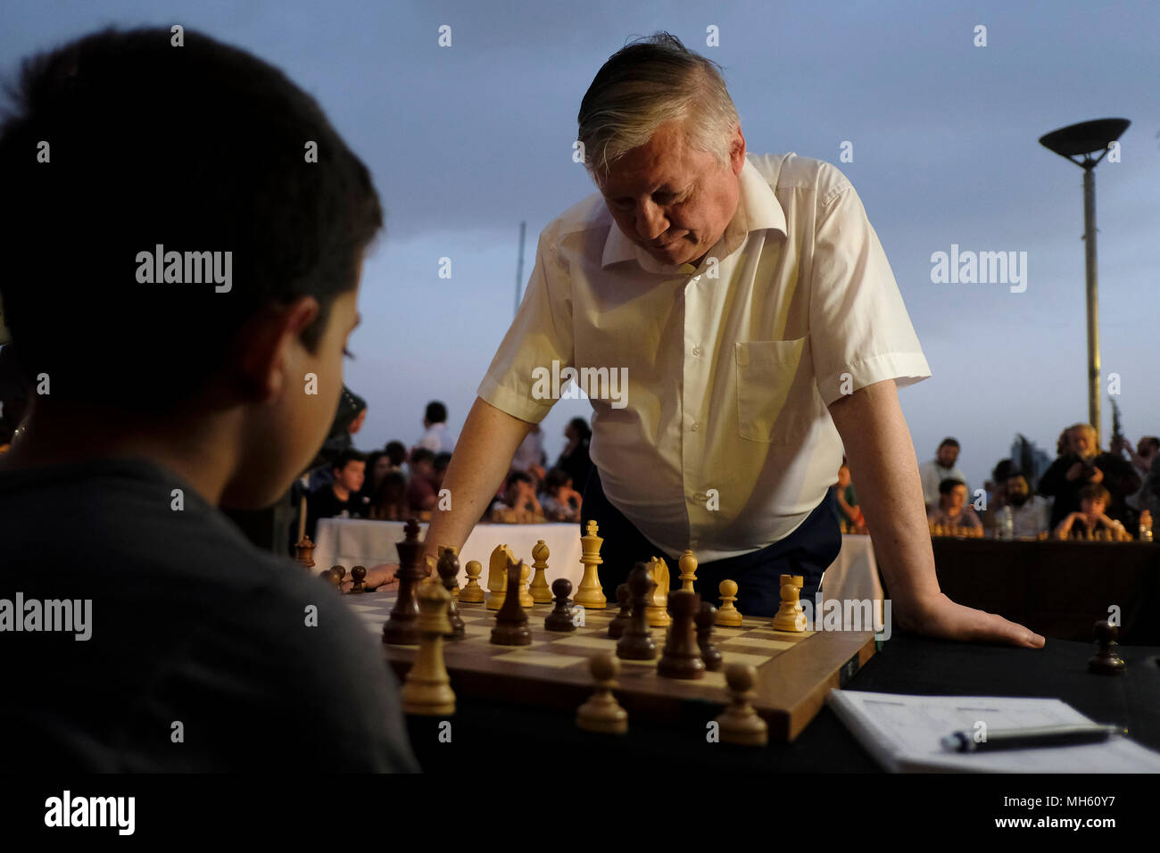 Jerusalem, Israel 30th April 2018. Russian State Duma member, chess grandmaster and former World Champion Anatoly Yevgenyevich Karpov giving a simultaneous exhibition with young Israeli participants during a simul display marking Israel's 70th anniversary in Jerusalem Stock Photo