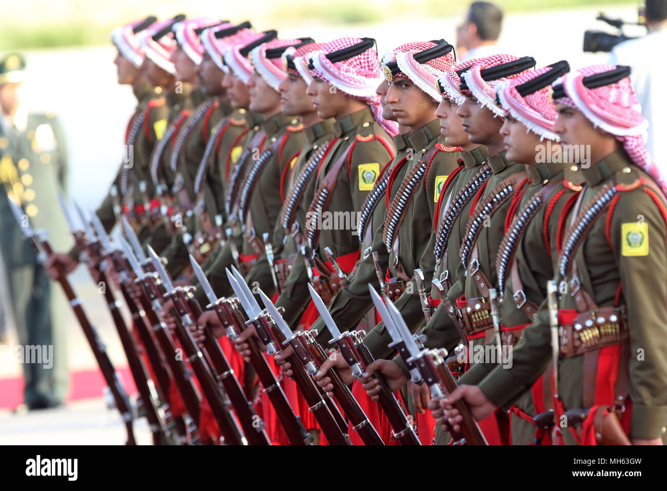 Jordanian royal guard stand in honor of Japan's prime minister Shinzo Abe  upon his arrival with