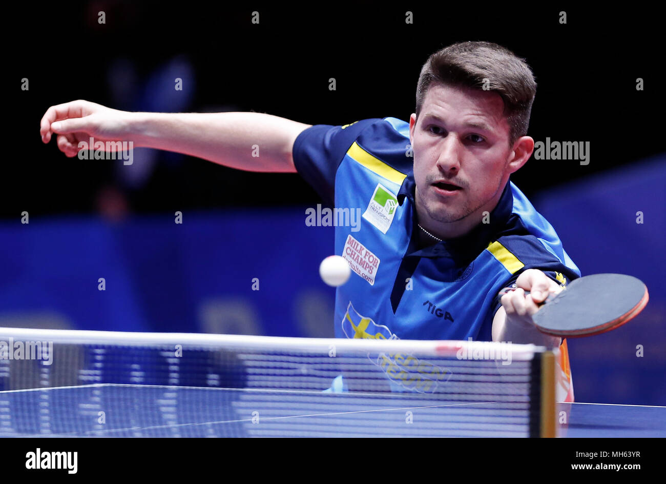 Halmstad, Sweden. 30th Apr, 2018. Kristian Karlsson of Sweden returns the  ball to Patrick Franziska of Germany during the Men's Group A third round  match of 2018 World Team Table Tennis Championships