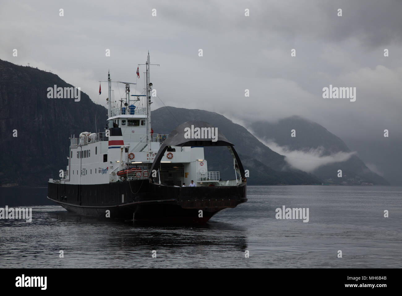 Ferry in Norwegian fjord Stock Photo