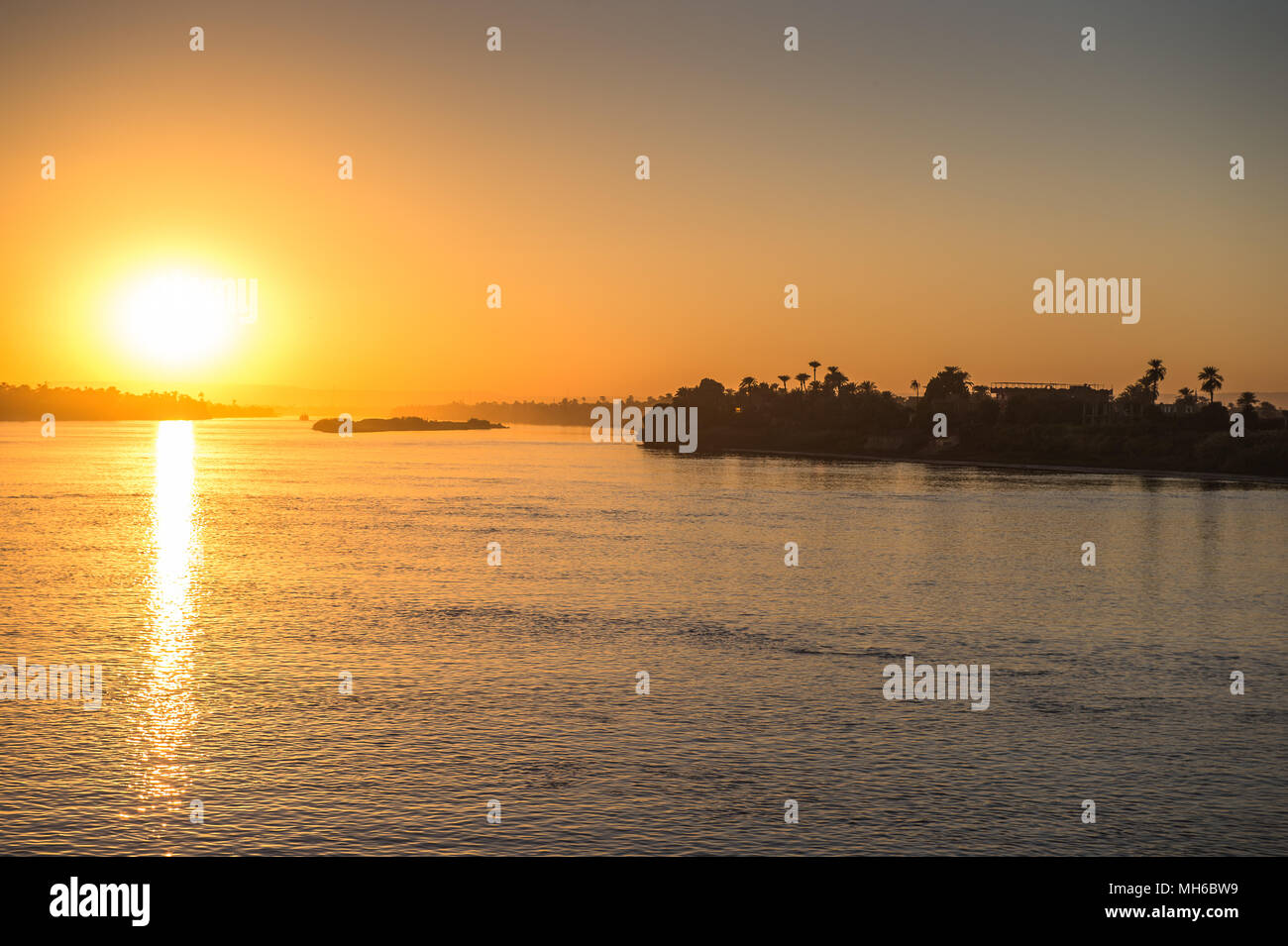 Sunset over the Nile river in Egypt Stock Photo - Alamy