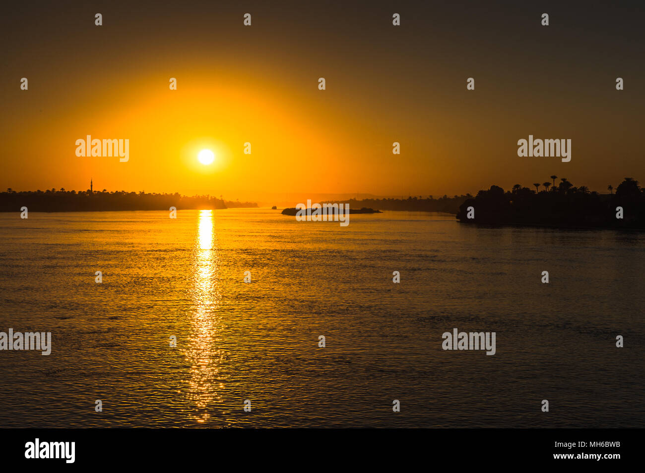 Sunset over the Nile river in Egypt Stock Photo - Alamy