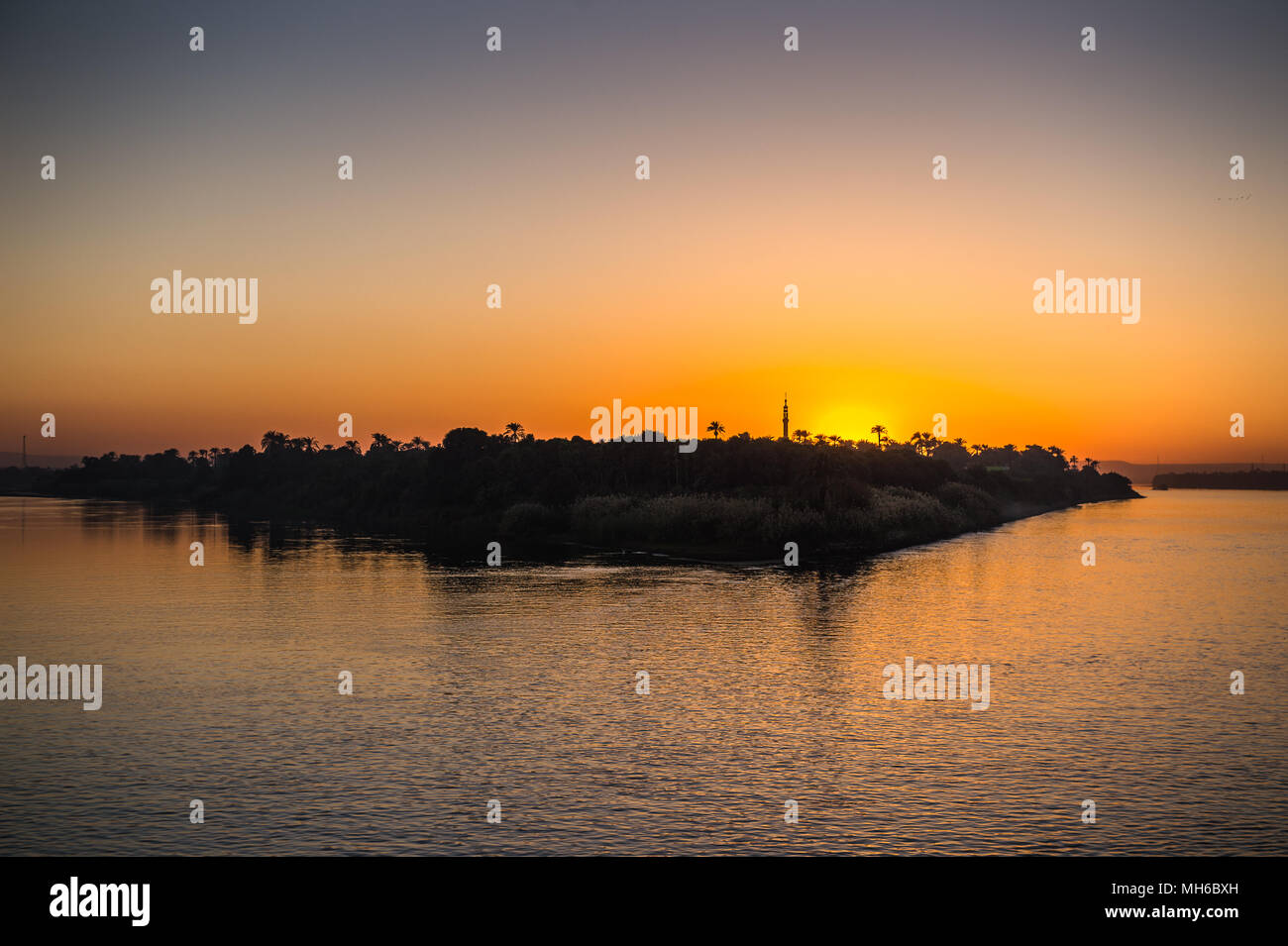 Sunset over the Nile river in Egypt Stock Photo - Alamy