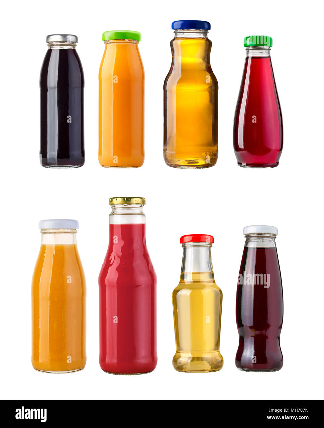 Premium Photo  Assorted juices in small glass bottles isolated on