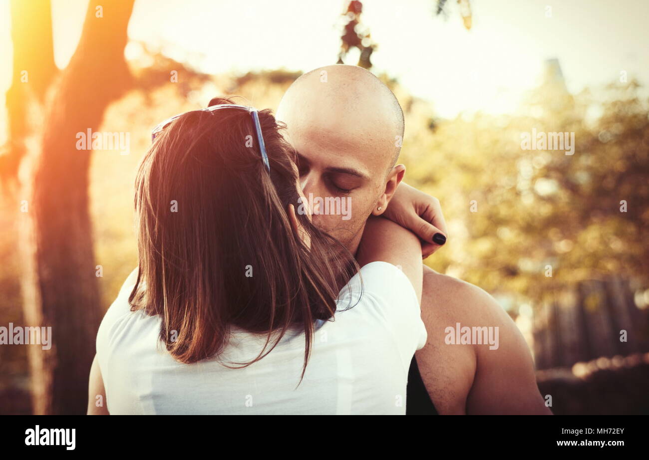 Happy couple in the sunlight Stock Photo - Alamy