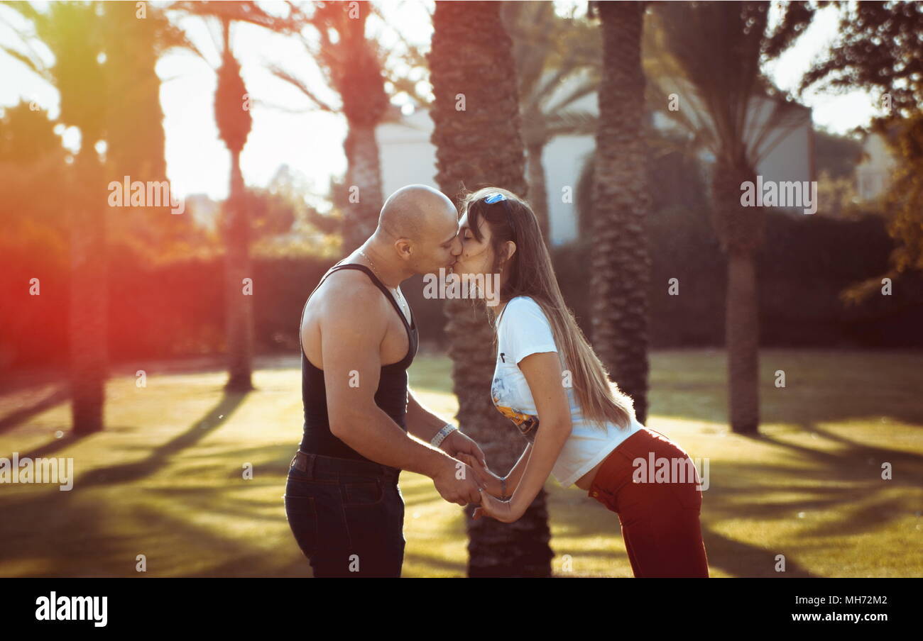 Happy couple in the sunlight Stock Photo - Alamy