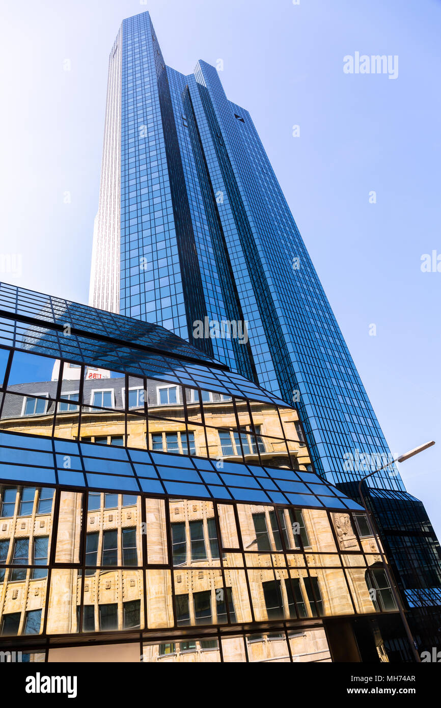 View from the bottom to the towers of the headquarter of the Deutsche Bank in Frankfurt Main, Frankfurt - Germany, April 07th 2018 Stock Photo