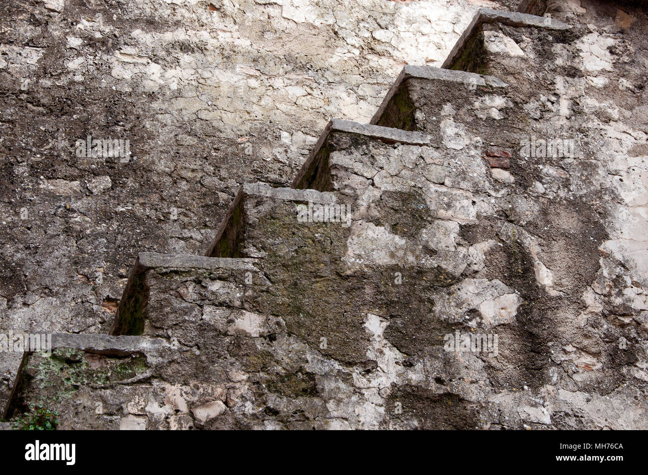 old stepped staircase of a castle Stock Photo
