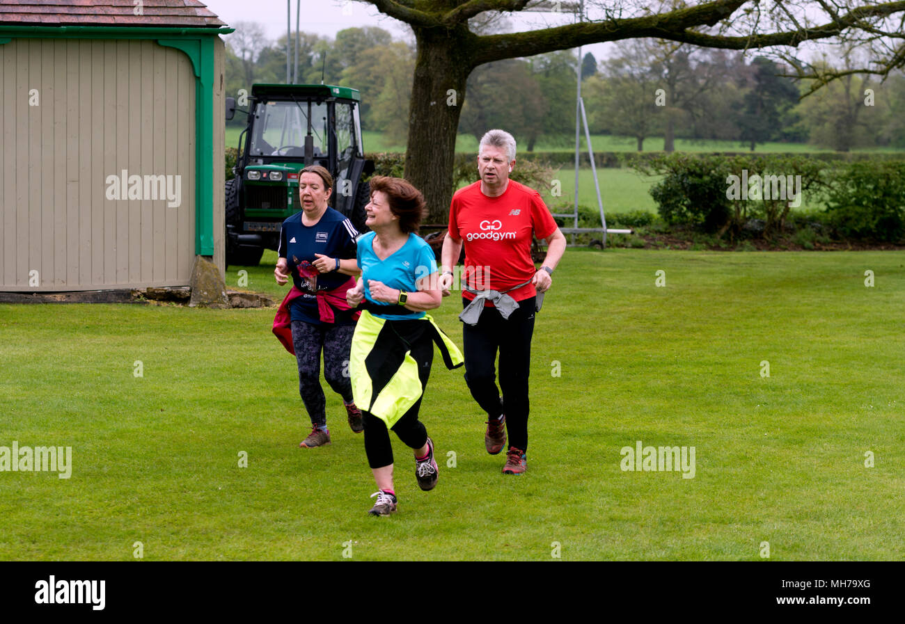 Runners taking part in Cirencester parkrun, Gloucestershire, UK Stock Photo