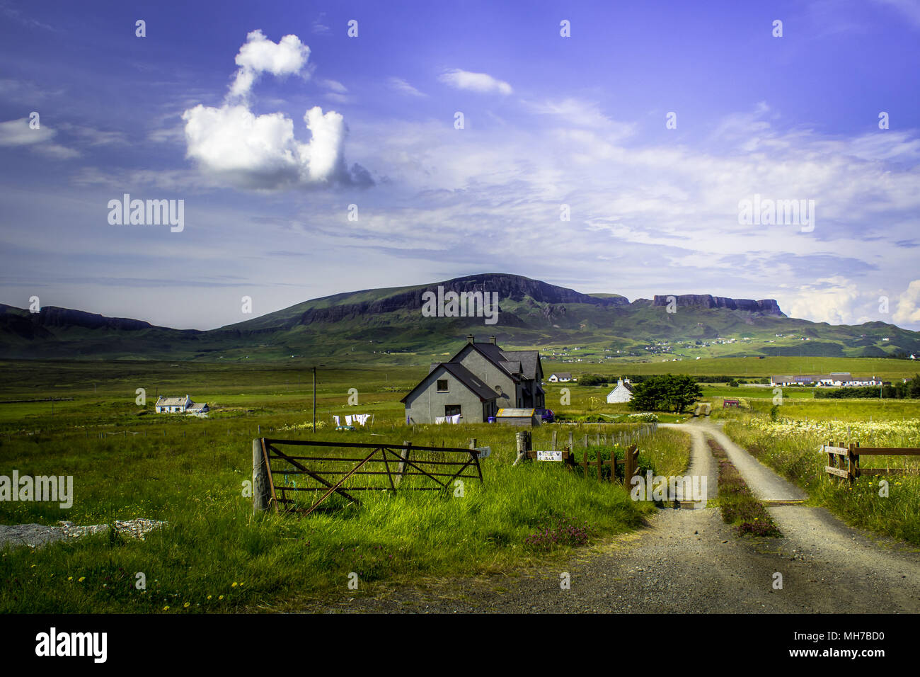 Rural house with beautiful green landscape Stock Photo - Alamy