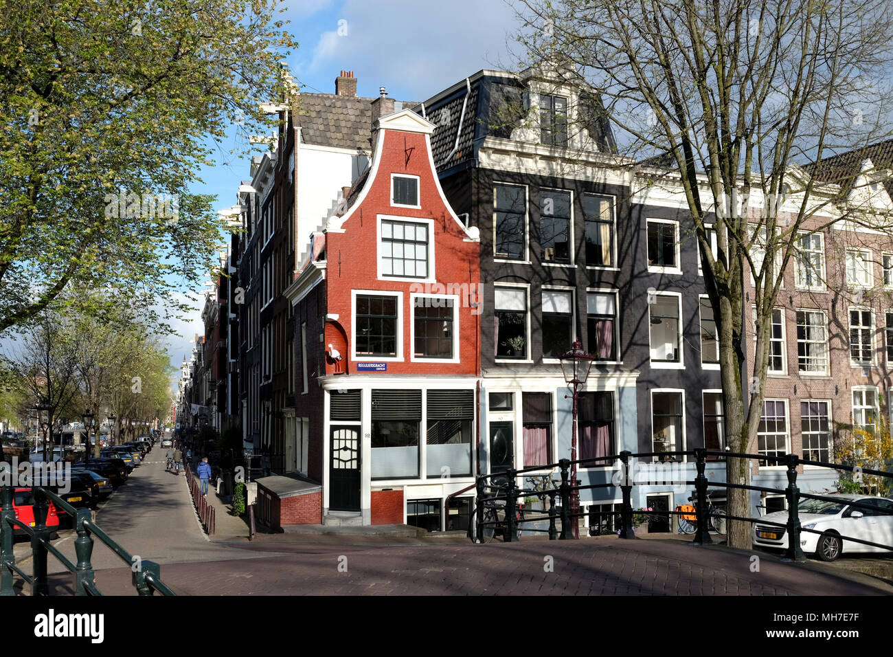 Beautiful red house in the street of Amsterdam, Netherlands Stock Photo -  Alamy