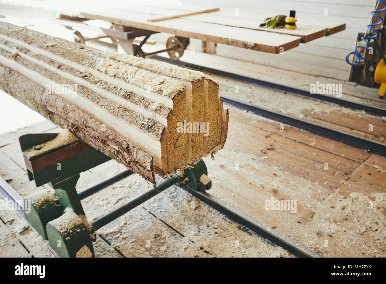 Lumber industry. Planks after cutting at the sawmill. Stock Photo