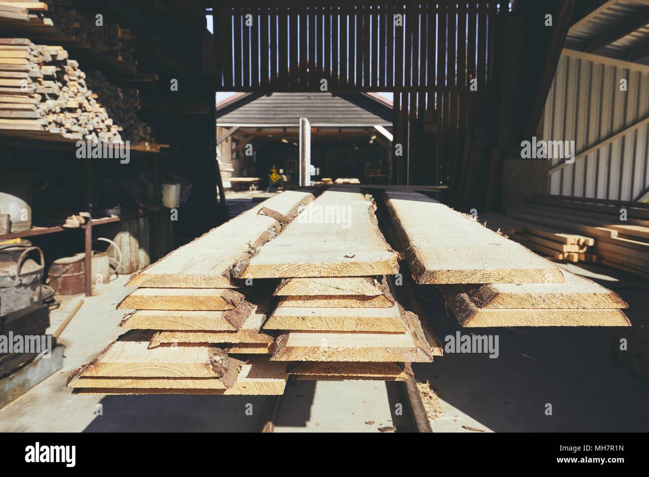 Lumber industry. Stack of timber at the sawmill Stock Photo Alamy