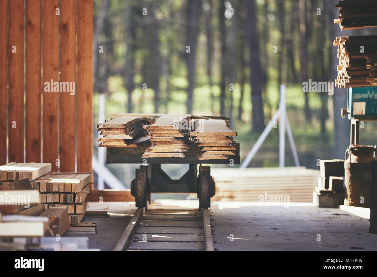 Lumber industry. Stack of the planks at the sawmill. Stock Photo